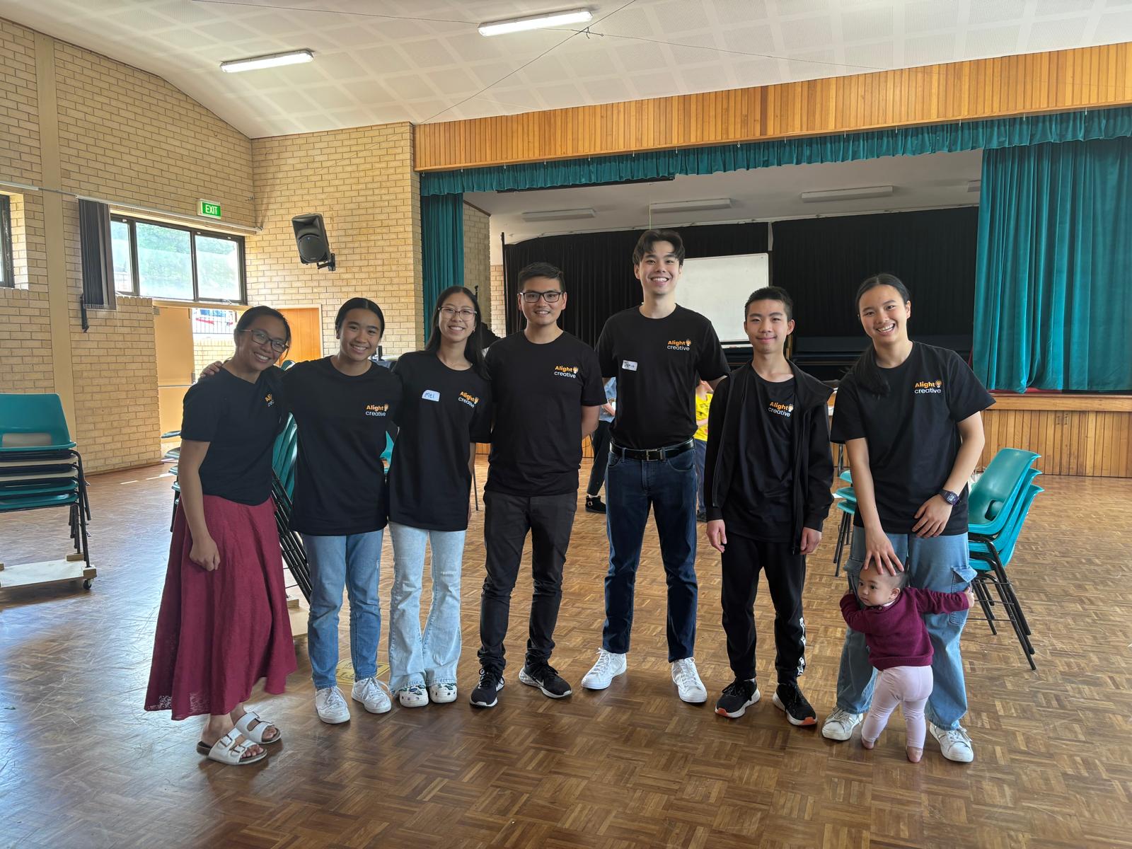 The Alight Creative team of tutors in the church hall